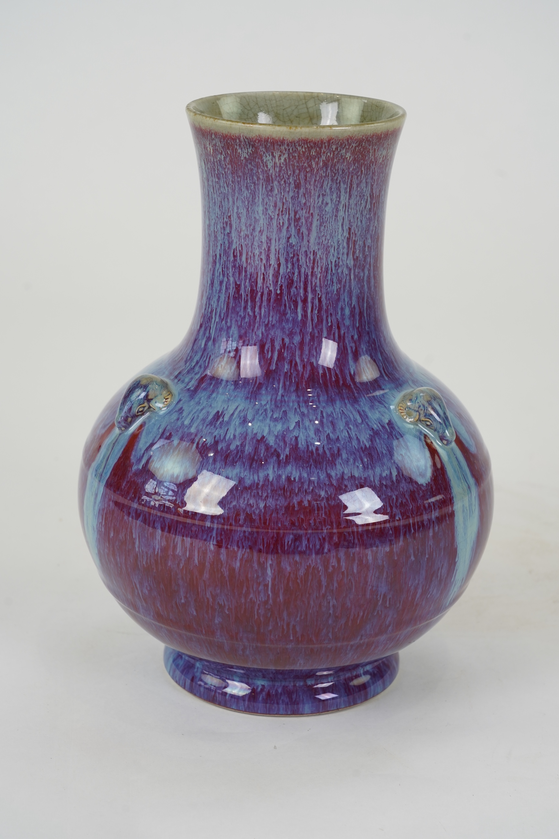A Chinese flambé glazed ‘three rams’ vase, sanxizun, Qianlong six character seal mark and of the period (1736-95)